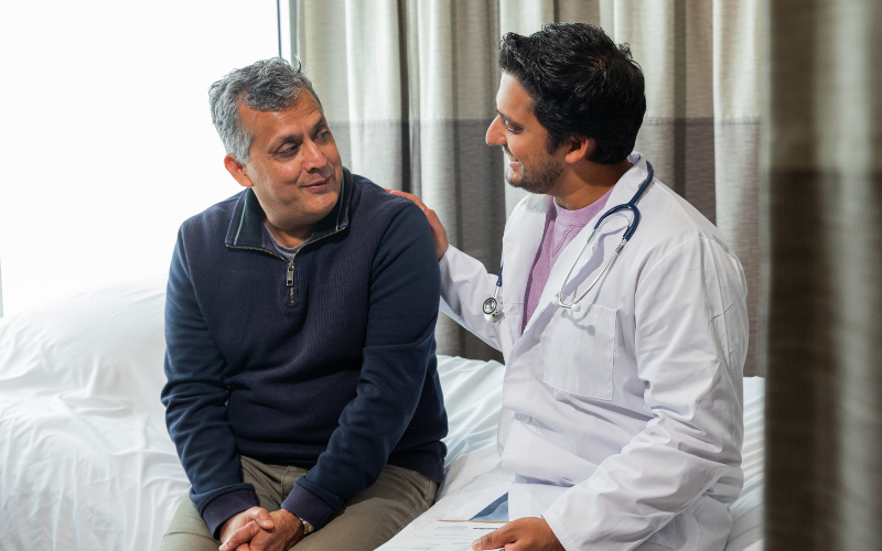 Doctor visiting patient at home